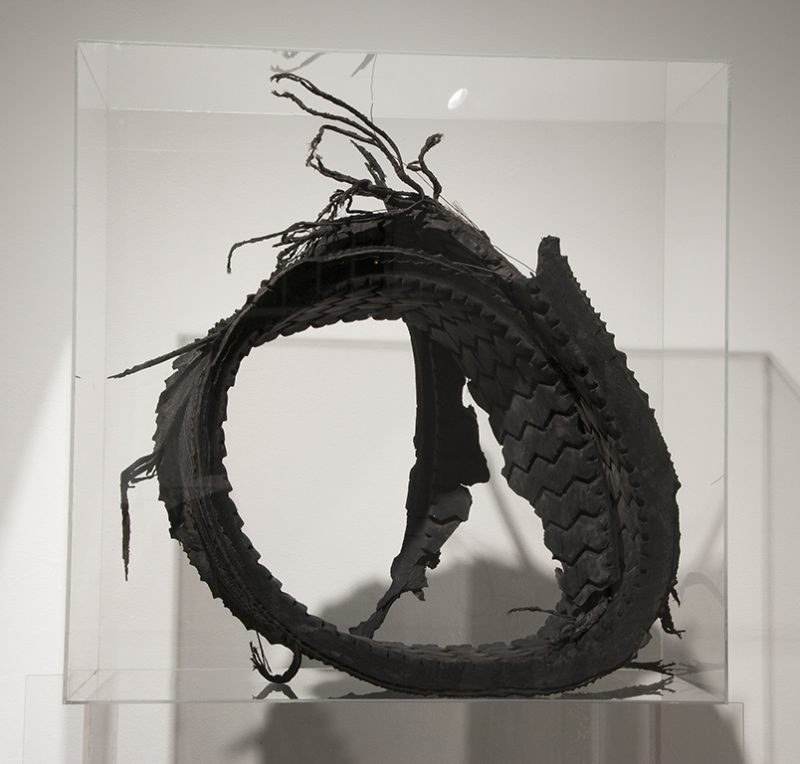 Joyce Westrop (Ottawa, Canada), Remnants of an Age, 2008, Tire remnant, plexiglas and wire, 24 x 24.25 x 13.5 inches. (Back View). Gift froom the Artist. Represented by Gallery 3, Ottawa, Canada.