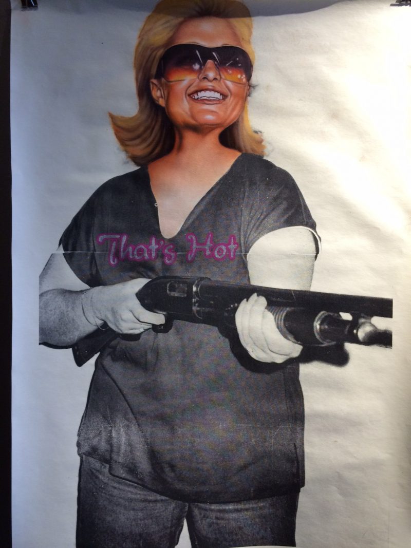 That's Hot (Paris Hilton), by Peter Shmelzer, 20 x 28 inches,  Oil on vintage shooting range poster, 2014, $600.