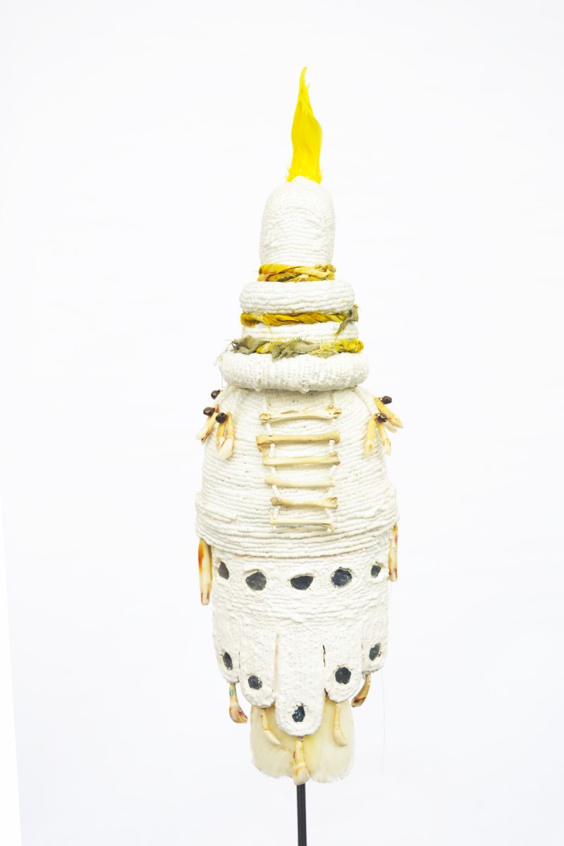 Rowan Corkill (London, Englsand). Vigilant Things - Cockatoo. 2017-18. Taxidermy Umbrella Cockatoo, Beads, Deer Teeth, Boar Tusks, Small Bones, Bells, Fabric. Animal died of natural causes, ethically sourced in the United Kingdom. Collection of Guy Berube. Gift from the artist. 