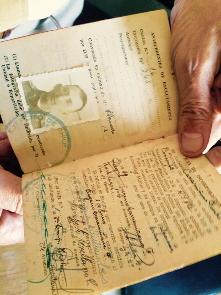 Former political prisoner Eugenio Carramiñana demonstrates his past identification papers 