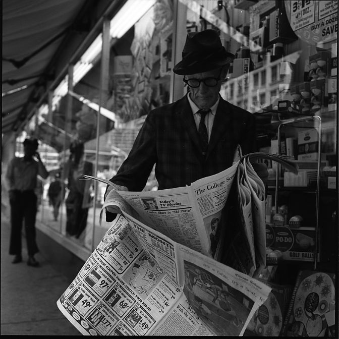 Vivian Maier, Chicago, Man Standing with Newspaper, 1968.