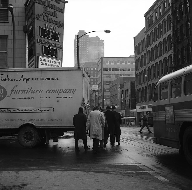 Vivian Maier, Chicago, Men Crossing Street Behind Truck. Circa 1965.