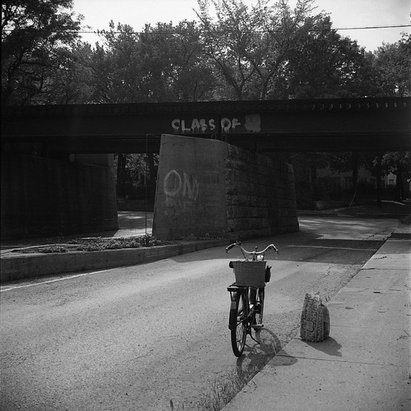 Vivian Maier, Highland Park, IL. Vivian's Bicycle by Viaduct.