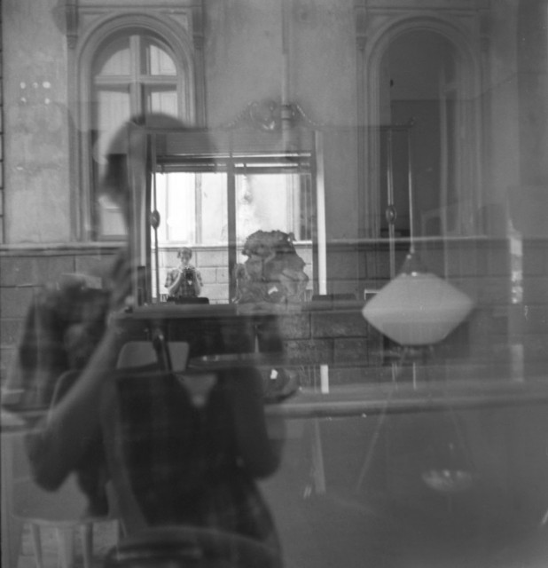 Vivian Maier, Italy, Self-Portrait, Window and Mirror Reflection. 1959.