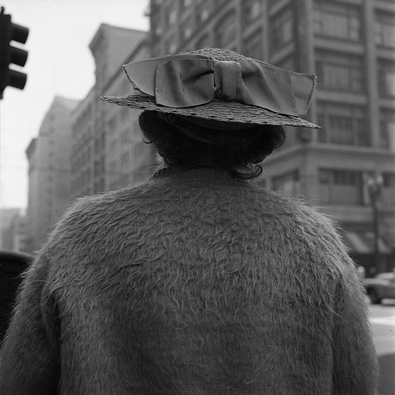 Vivian Maier, Los Angeles, Woman in Sweater From Behind. 1955.