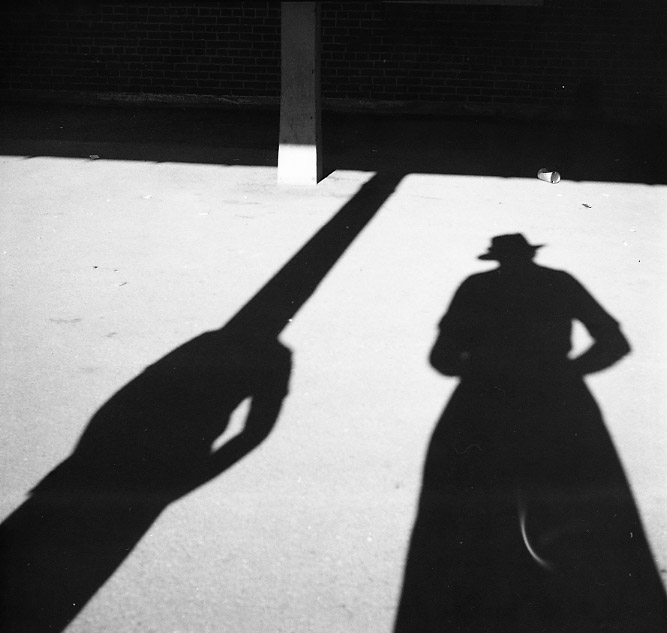 Vivian Maier, Northshore Chicago, Vivian's Shadow on Train Platform. Circa 1968.
