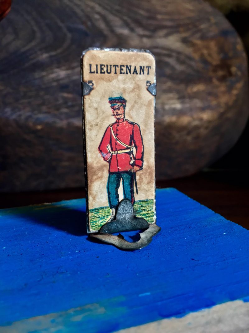 Antique Soldier on Metal Mount (removeable from metal mount). Measures 2.25 inches height x 1 inch width. $25.
