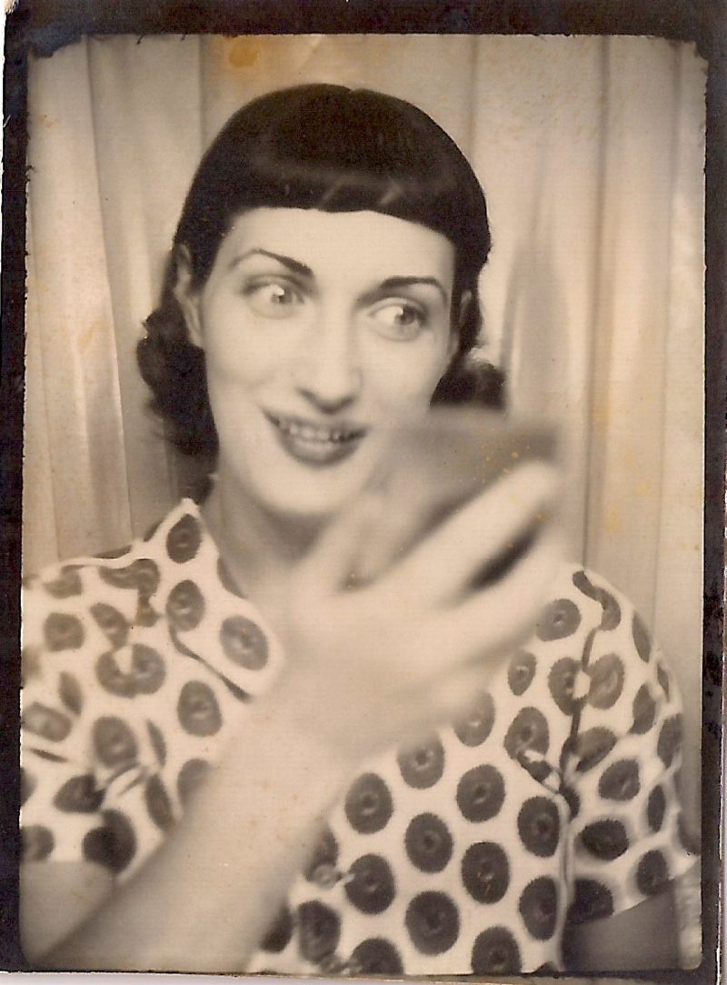 Photo Booth Photograph of Beautiful Smiling Woman, Written on verso: 'Fabienne Lloyd, 1939', (1919-1997). The daughter of Arthur Craven and Mina Loy, Lloyd was also photographed by Berenice Abbott, Man Ray & Carl Van Vechten. Measures 1.5 x 2 inches. Currently being appraised. (One of 3 prints)