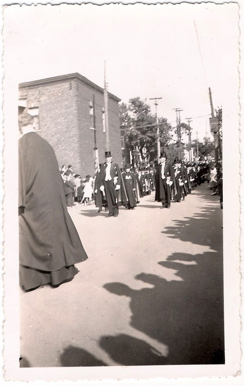 Vintage Anonymous Photograph, 'Ceremonial Parade with Dudes Dressed in Capes & Top Hats' Measures 3 x 4.5 inches. $15