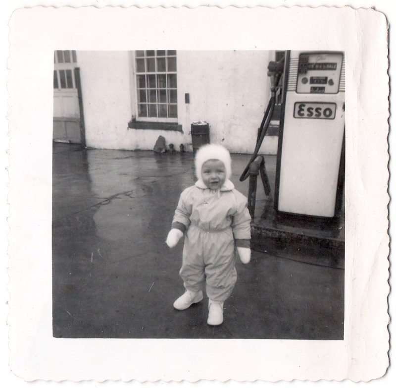 Vintage Anonymous Photograph, 'Happy Child in Snowsuit in Fluffy Bonnet at Esso Station', Measures 3.5 x 3.5 inches. $15