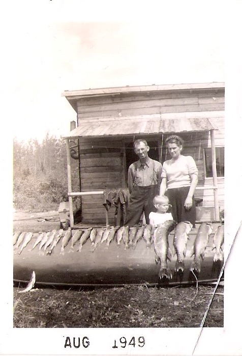 Vintage Anonymous Photograph, 'Unsmiling Parents with Impressive Fish Catch & Unimpressed Child', Dated Aug 1949, Measures 2.5 x 3.5 inches. $10