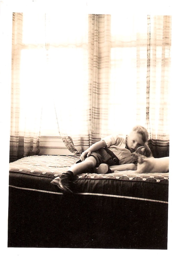 Mid Century Vintage Authentic Photograph, 'Beautiful Boy Posing with Ghost Doggy', 1940's'. Measures 2.5 x 5.5 inches. From an American Estate Sale. $25 for the pair.