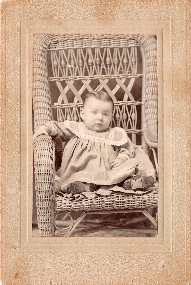 Mid Century Authentic Photograph,  'Baby in Old Shoes Sitting in Rattan Chair'. Measures 3.5 x 5.5 inches. $15