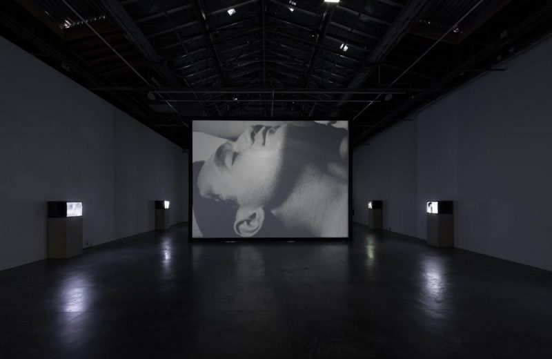 Ugo Rondinone: I LOVE JOHN GIORNO Installation View of Sleep by Andy Warhol, 1963, at Palais de Tokyo, 2015 ©The Andy Warhol Museum, Pittsburgh; Founding Collection, 2017 The Andy warhol Foundation for the Visual Arts, Inc./ Artists Rights Society (ARS), New York, Photo: Aurelien Mole 