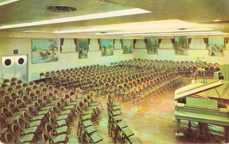 Mid Century Vintage Postcard, 'Kingdom Hall for Jehovah's Witnesses, Brooklyn Bethel, USA'. 'This beautiful auditorium seats 500 and was the largest broadcasting studio for Radio Station WBBR. It has a concert organ with 1200 pipes and inspring oil-painted murals depicting scenes from the many lands'. Measures approx. 4 x 6 inches (sizes vary). $15. (no handwriting on verso)