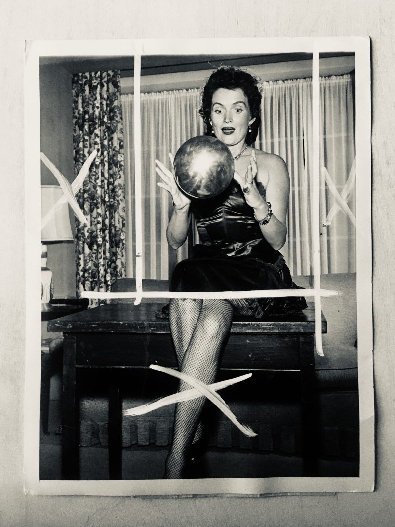 'Mysterious Babe with Floating Metallic Ball'. Mid Century Vintage Authentic Photograph. Measures approx. 8 x 10 inches. Notice white grease pencil cropping marks used for press publication. SOLD.