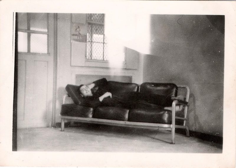 Mid Century Vintage Authentic Photograph, 'Happy Man Lounging on Sofa', Dated 1957 on verso. Measures 4..5 x 3.25 inches From an American estate sale. $30.