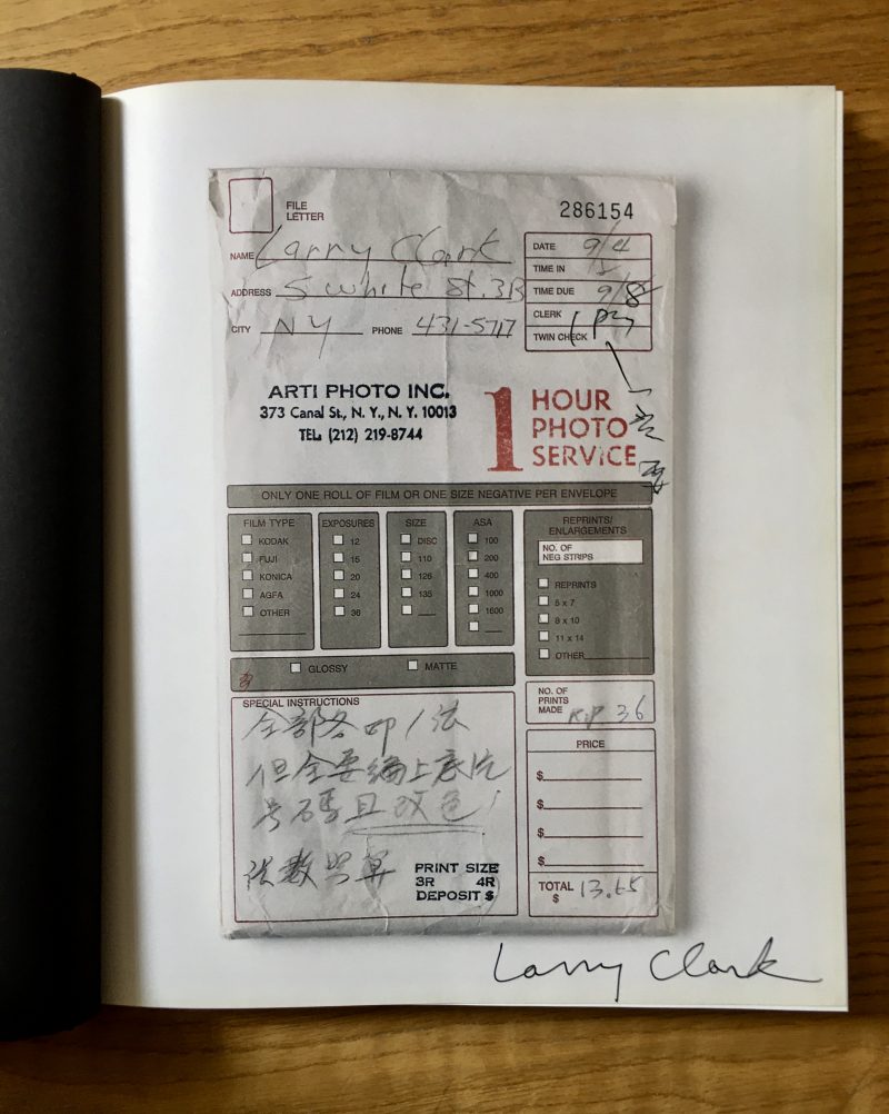 Photo of actual book for sale. Notice authentic signature by Larry Clark.
