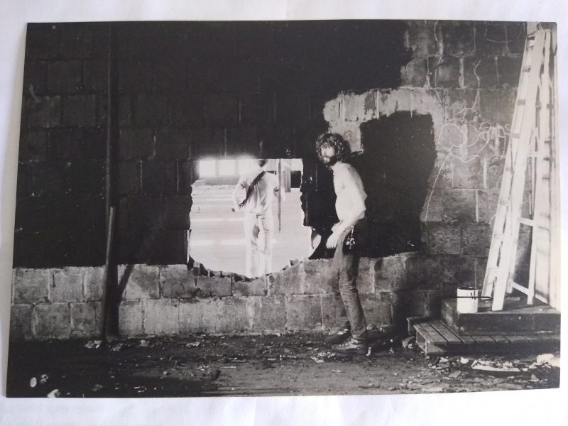 2. Untitled (from the Pier photographs series) 4.5 x 6.75 inches, 1975-1986. A portrait of Tava working on a mural. 