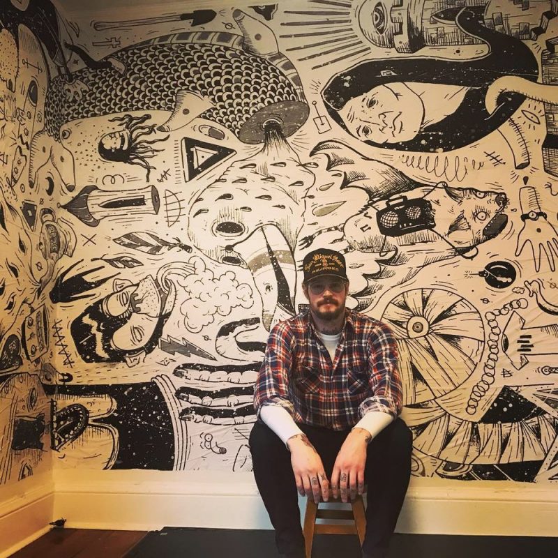 Hayden Menzies with custom mural.