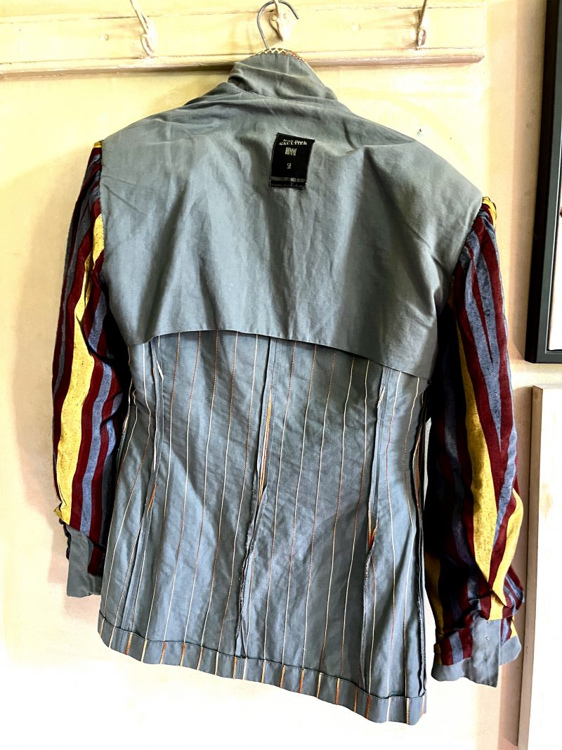 JEAN-PAUL GAULTIER, Homme, Size 50. Made in Italy. Embroidered Jacket, Light Olive Green. Detailed Stitching. Covered Buttons. Stripped Lining for 1 inner pocket & inner sleeves. 3 outer pockets. $400.