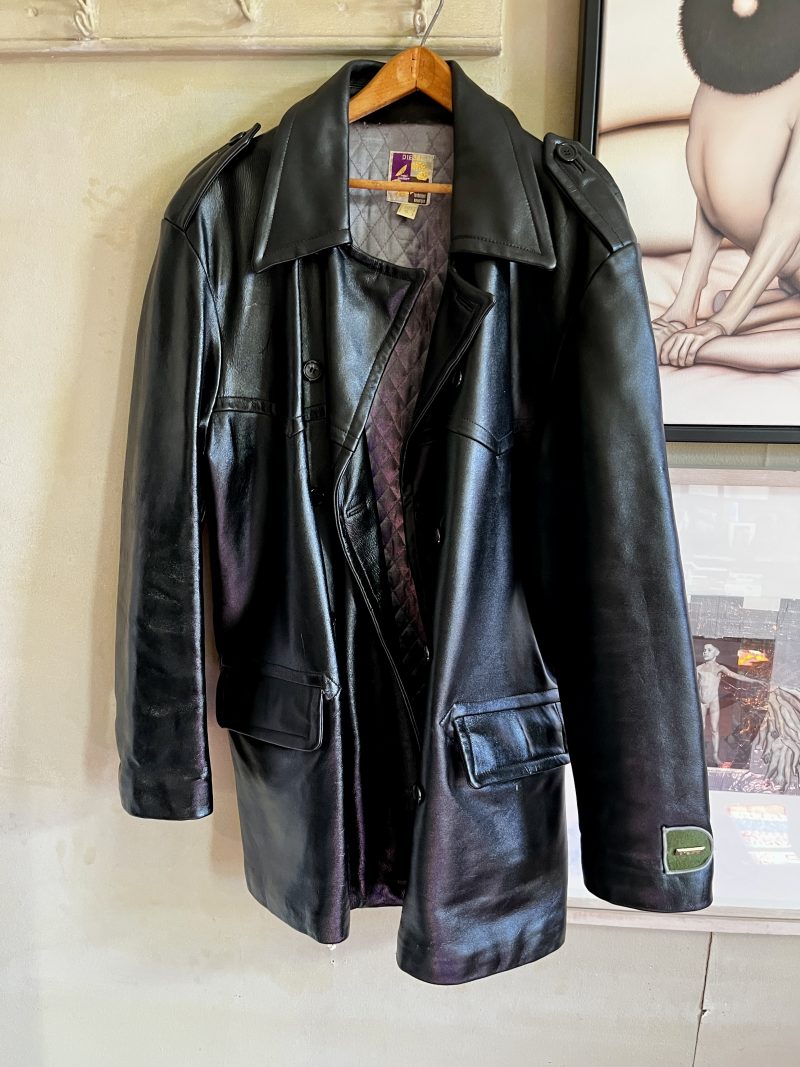 DIESEL, 'Men's X/Large, Real Leather Coat / Technique Cosmique', Heavy Winter Coat, Silver Quilted Lining. Can be done up either to the left or to the right as there are loops on either side. One inner pocket. Two outer pockets. New York, 1990's. $600