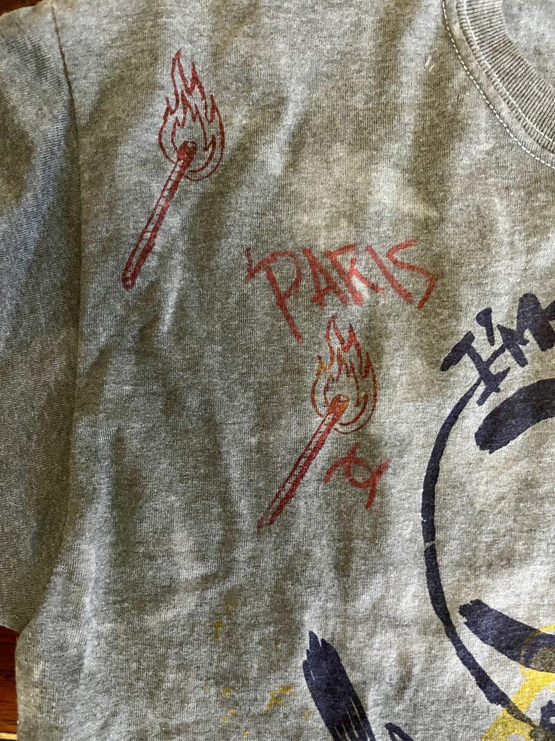 SCOOTER LAFORGE TSHIRT #3, 'FAKE CHANEL', Large Men (Unisex), Hand Painted & Printed & Dyed Cotton Grey T-shirt with Custom Hand-Stitched Label with 'Bear & Hearts': Classic trademarks  from the earlier years. Notice 'Paris is Burning' reference. USD$200. 